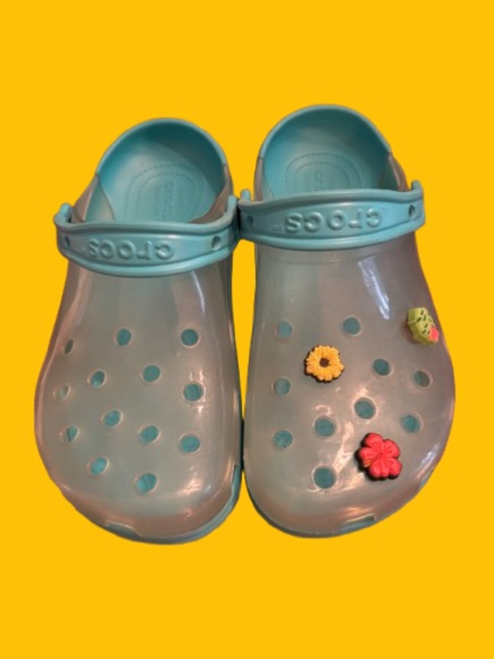CROCS Women’s Translucent Light Teal Clogs with Floral Jibbitz VGUC size 7